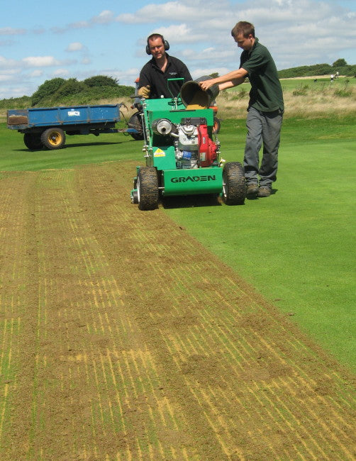 IMG_7137 Filling the hopper while scarifying  P & K.jpg