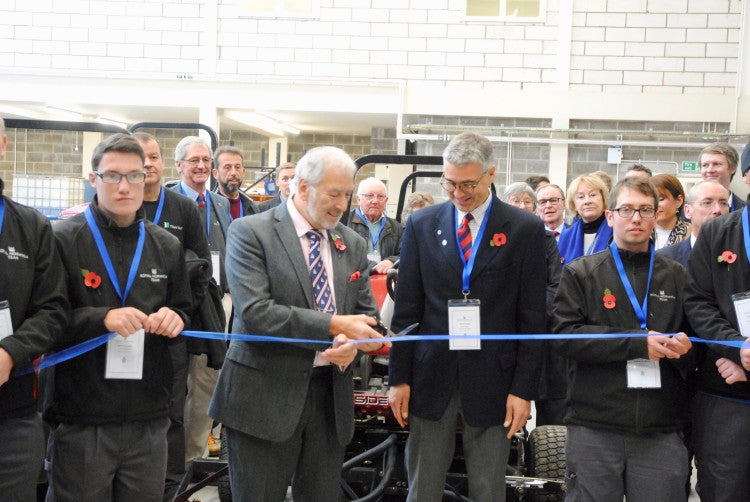 Stephen Bernhard And Peter Todd Cutting The Ribon