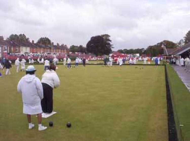 World's Women bowlers brave the elements.